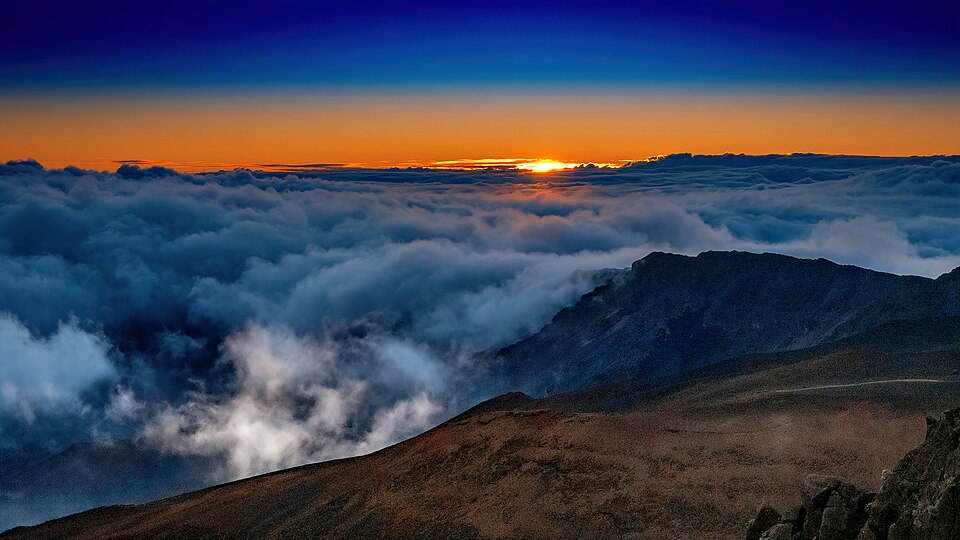Sunrise above the clouds at Haleakalā on Maui.